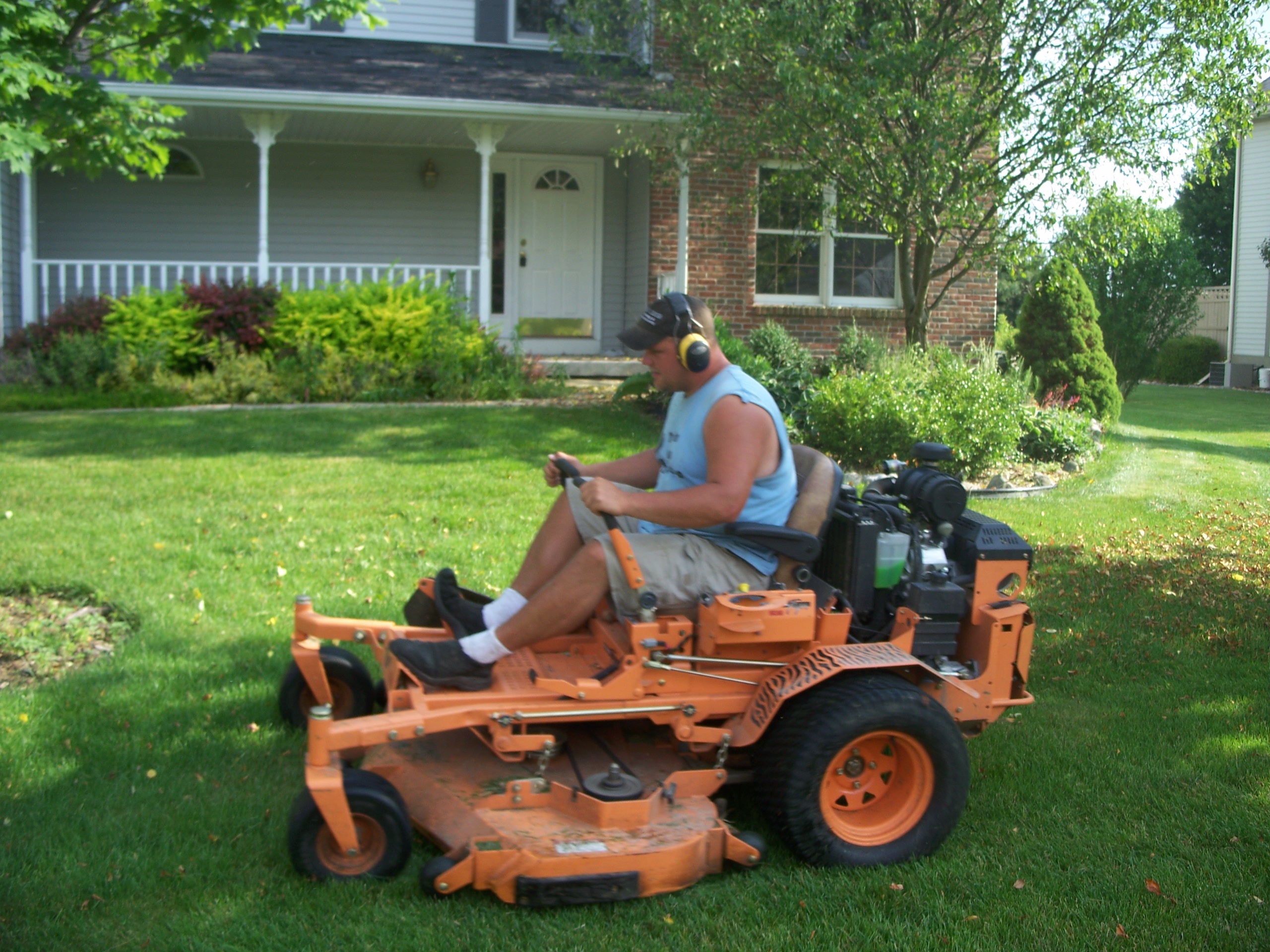 Twin Oaks lawn mowing by owner Dan Izdebski.